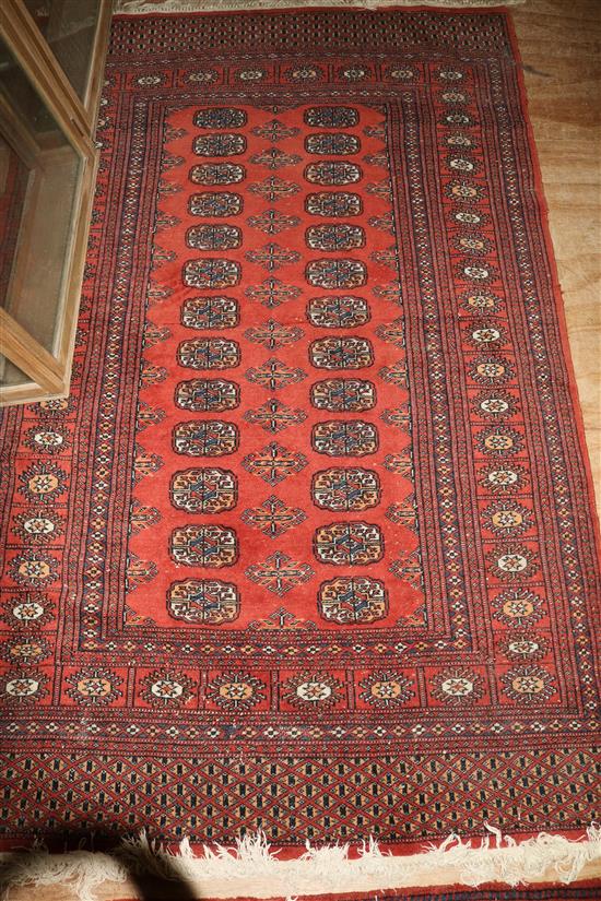 Red ground Bokhara rug(-)